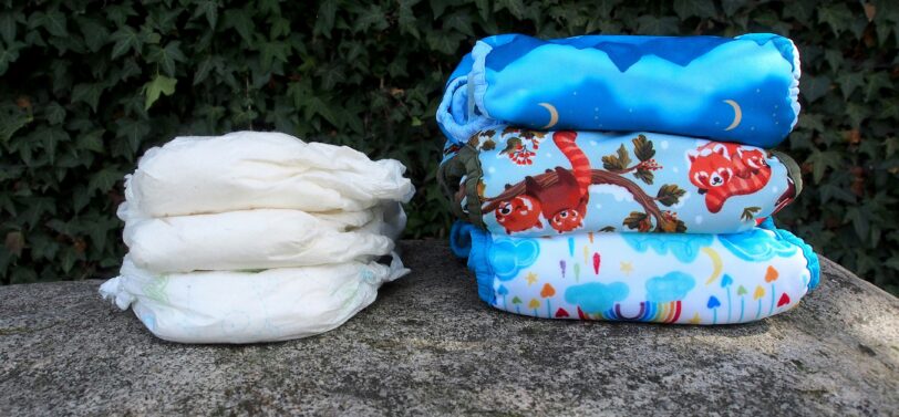 two piles of nappies on grass.