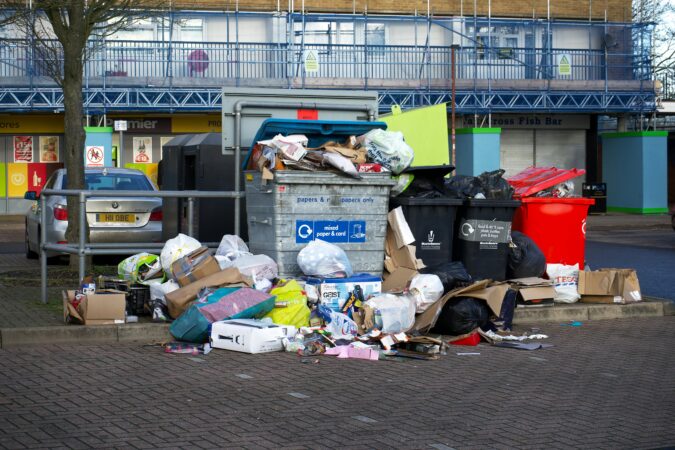 overflowing commercial bins