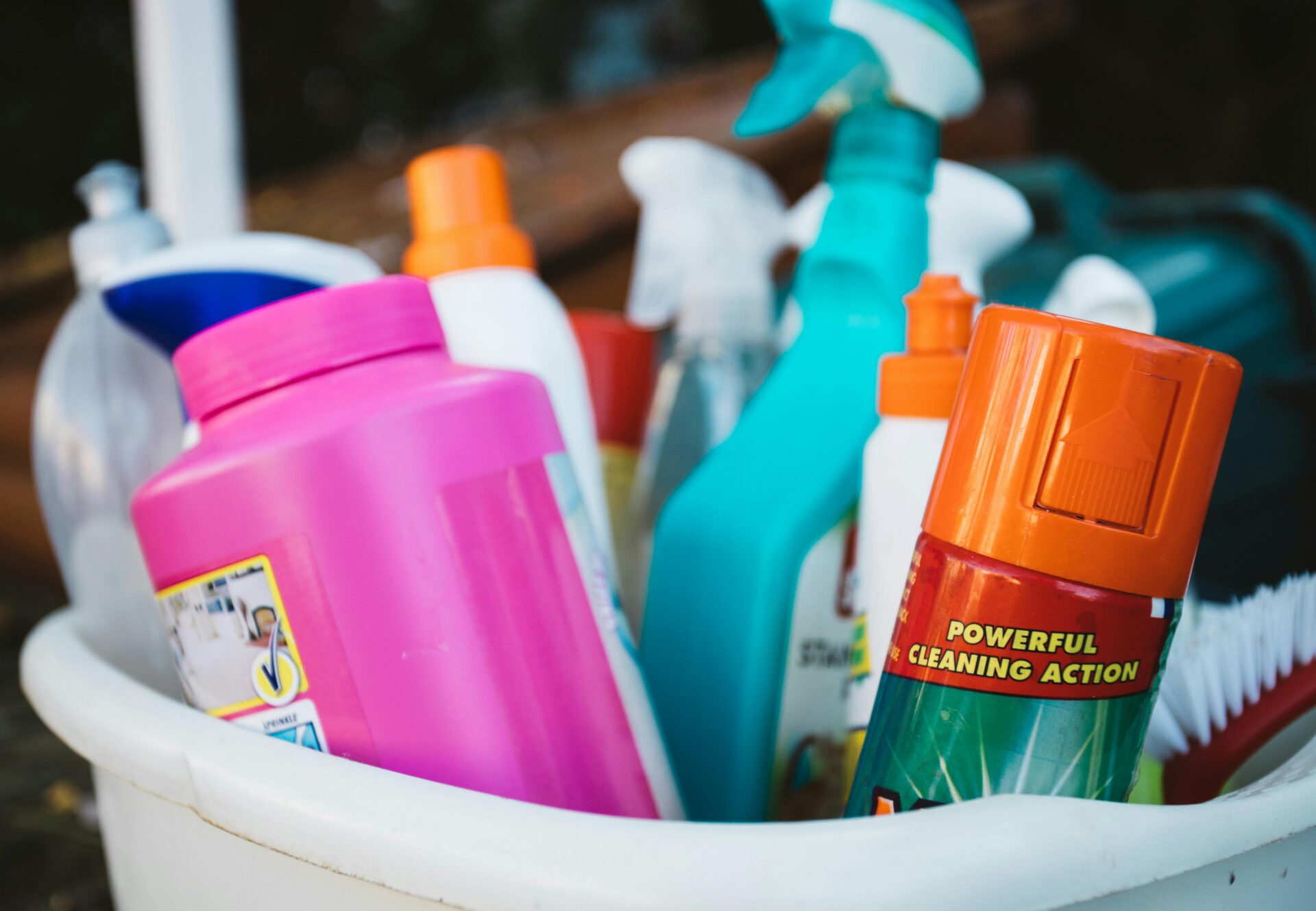 cleaning products in a bucket